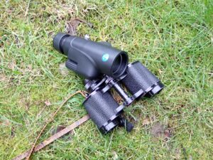 Binoculars on grass