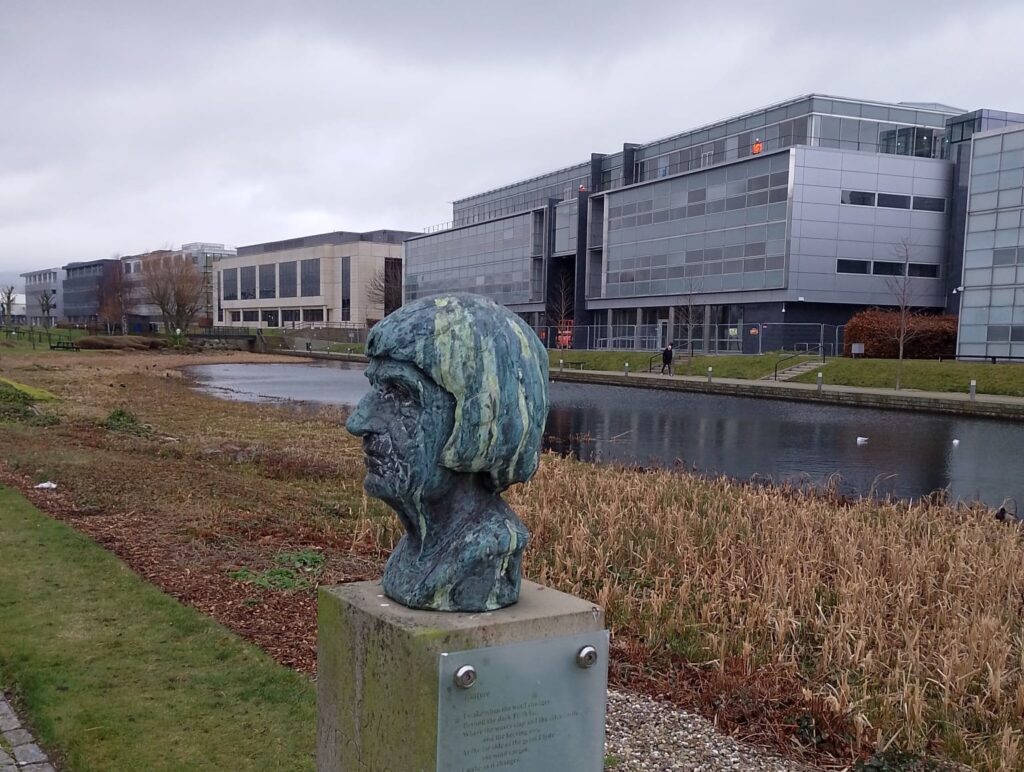 Exterior shot of buildings at the Gyle with statue in the foreground